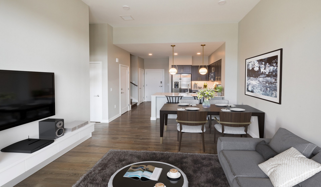 The Fremont Residences - Aurora, CO - Living.Spacious living area opens up to your luxury kitchen