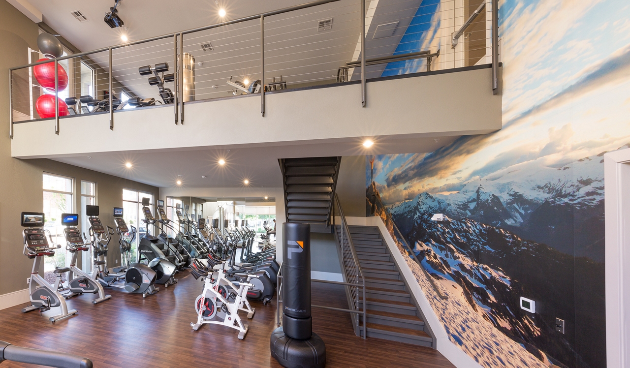 21 Fitzsimons Apartments in Aurora, CO Fitness Center.<p>&nbsp;</p>
<p style="text-align: center;">Stair masters, rowers and bicycles are just a few of the many workout options you'll find at your fitness center.</p>
