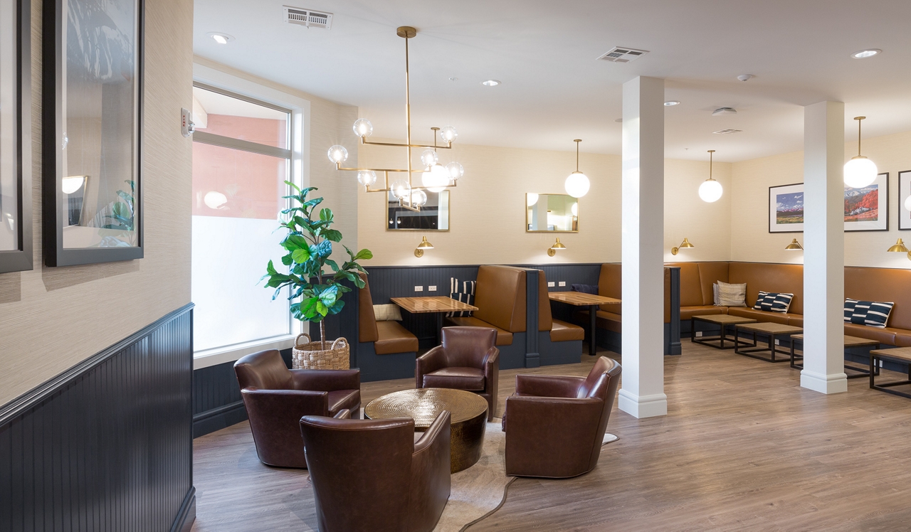 21 Fitzsimons Apartments in Aurora, CO Lounge.<div style="text-align: center;">&nbsp;</div>
<div style="text-align: center;">Get work done in the study area with lounge seating.</div>
