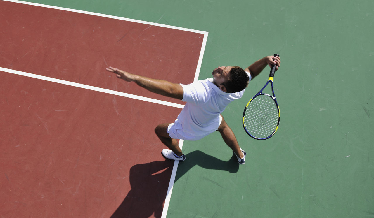 The Residences at Capital Crescent Trail - Bethesda, MD - Person playing tennis