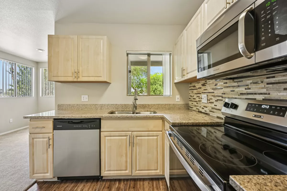Kitchen sink, window and range at Indigo Creek