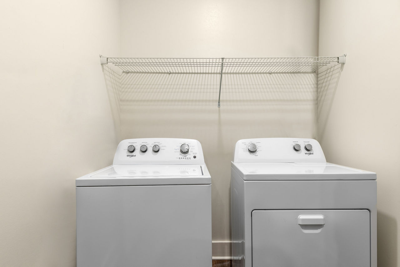 Laundry room at Lirio at Rafina