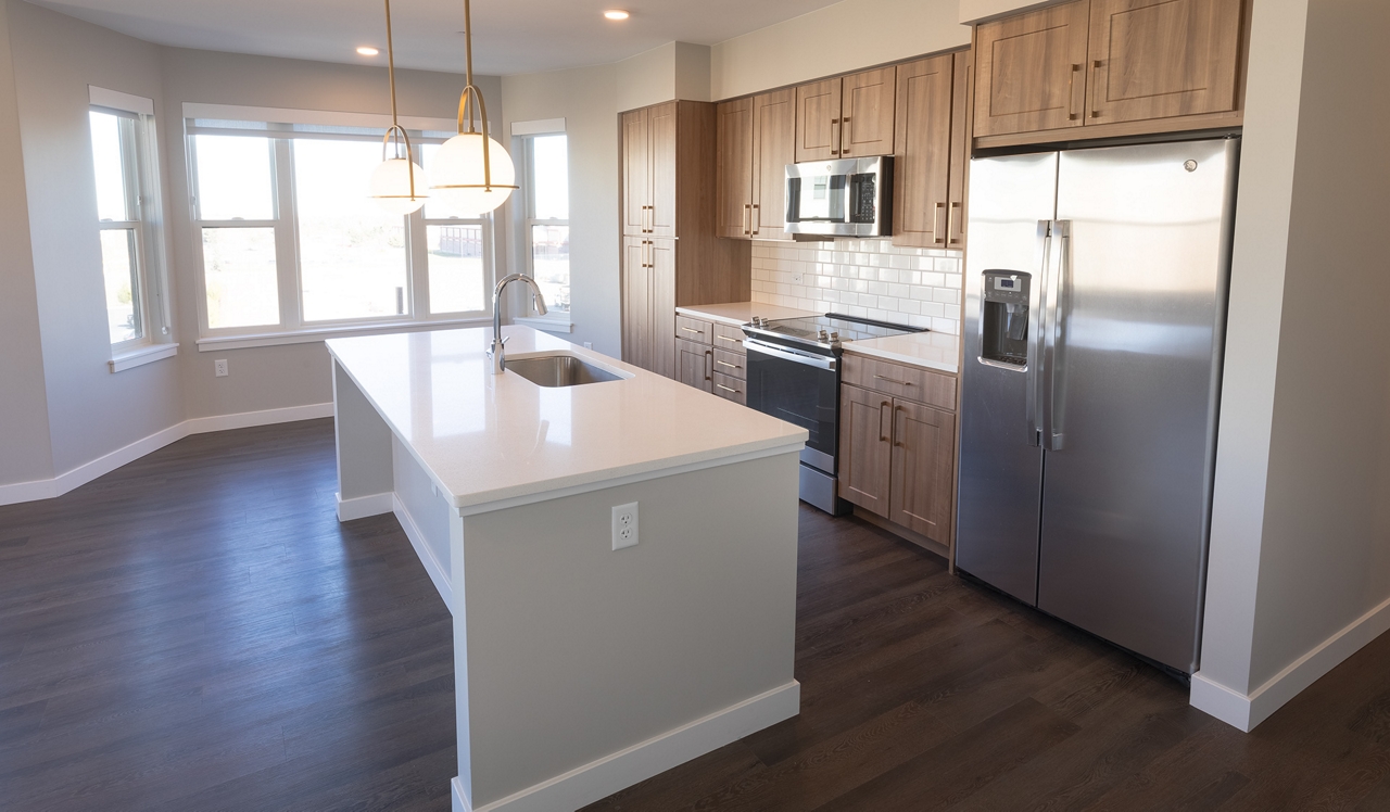 The Fremont Residences - Aurora, CO - kitchen.With a variety of layouts and finish packages to choose from, everyone can find their perfect home at The Fremont