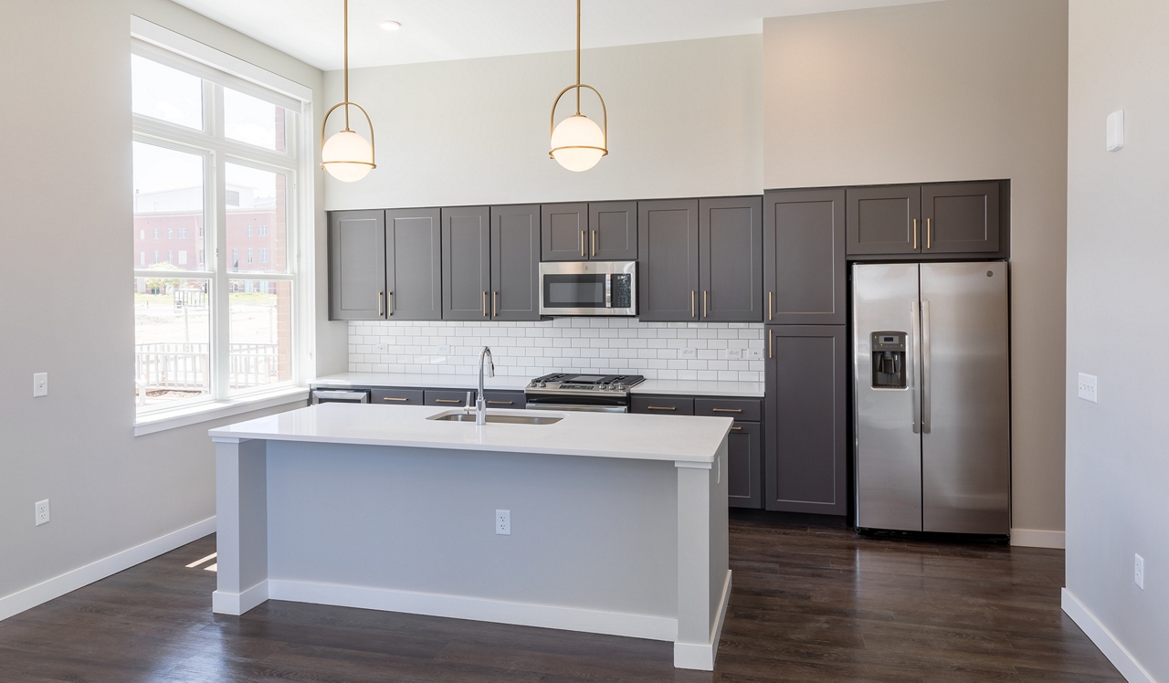 The Fremont Residences - Aurora, CO - kitchen.Tasteful interiors with a fresh, modern look