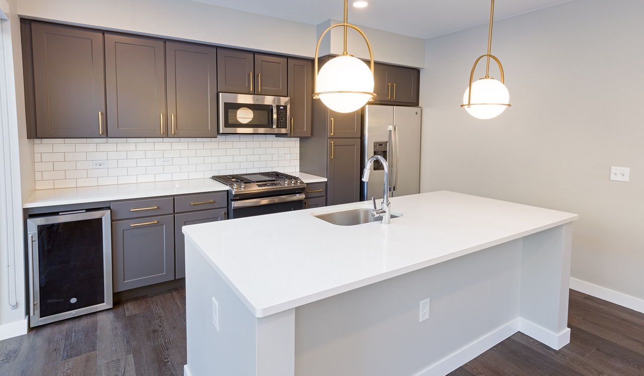 Fremont Residences - Aurora CO - Townhome kitchen.Townhomes come equipped with beautifully styled interiors and kitchens