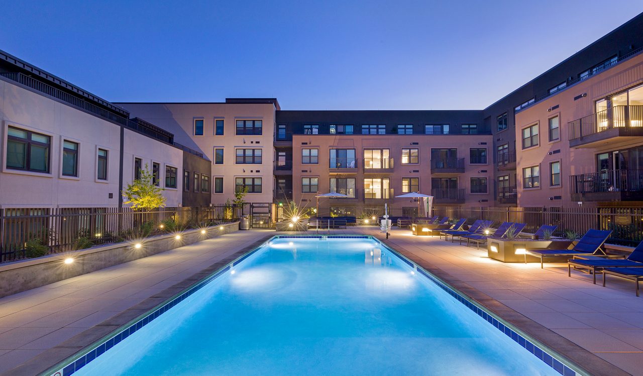 The Fremont Residences Pool and Courtyard at night