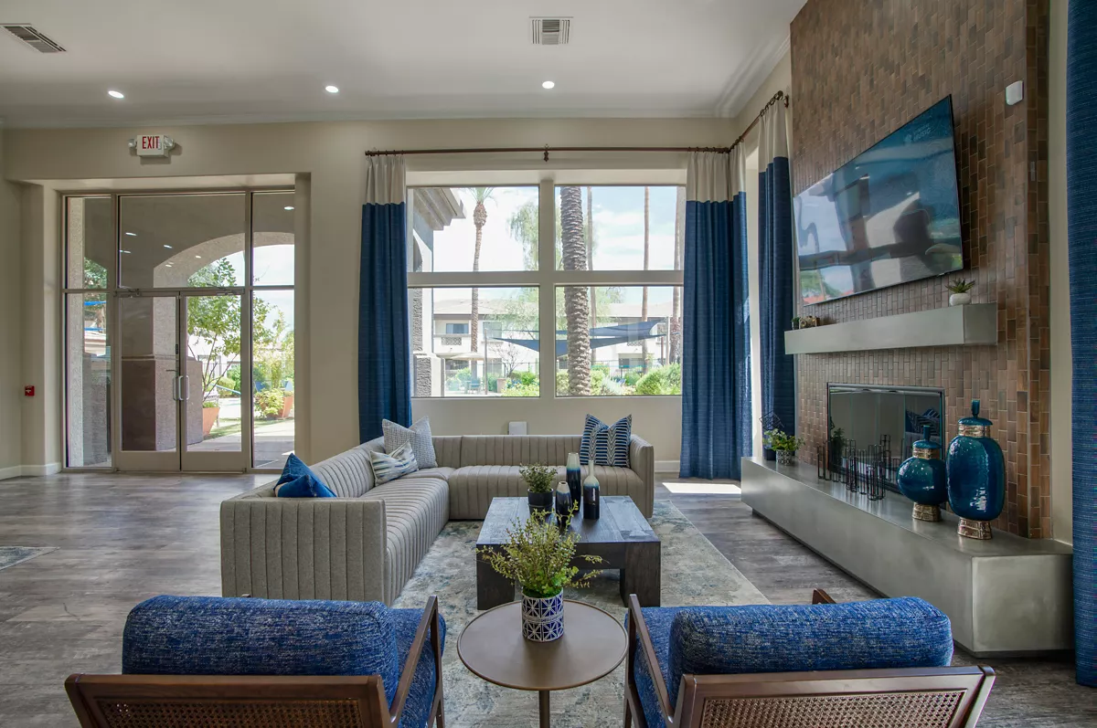Clubhouse lounge with fireplace at Indigo Creek