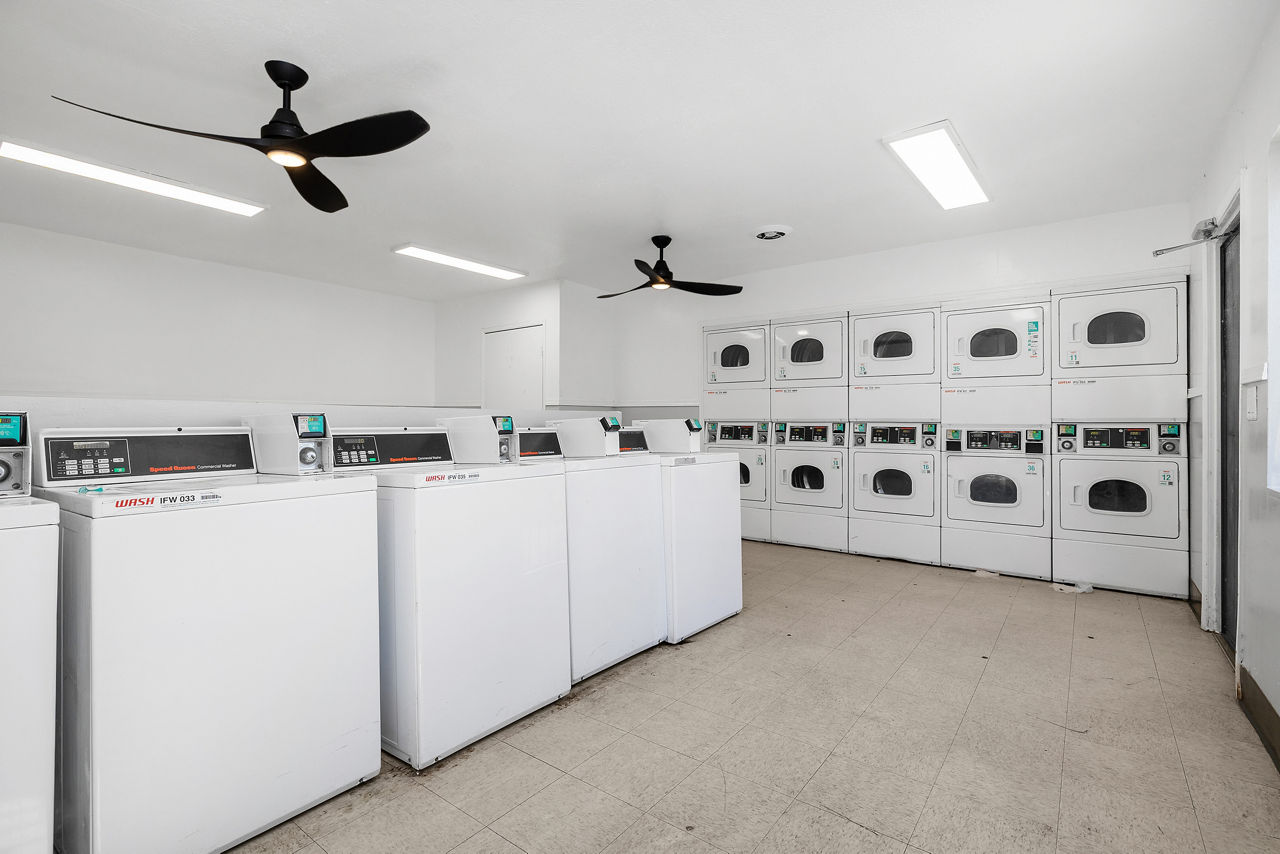Laundry room at Palms Apartments