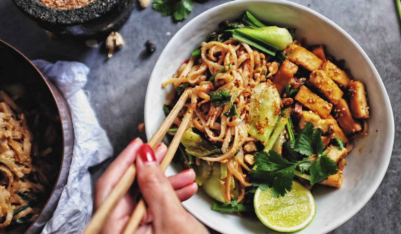 Chestnut Hall - Philadelphia PA - Person eating Thai noodles with chopsticks