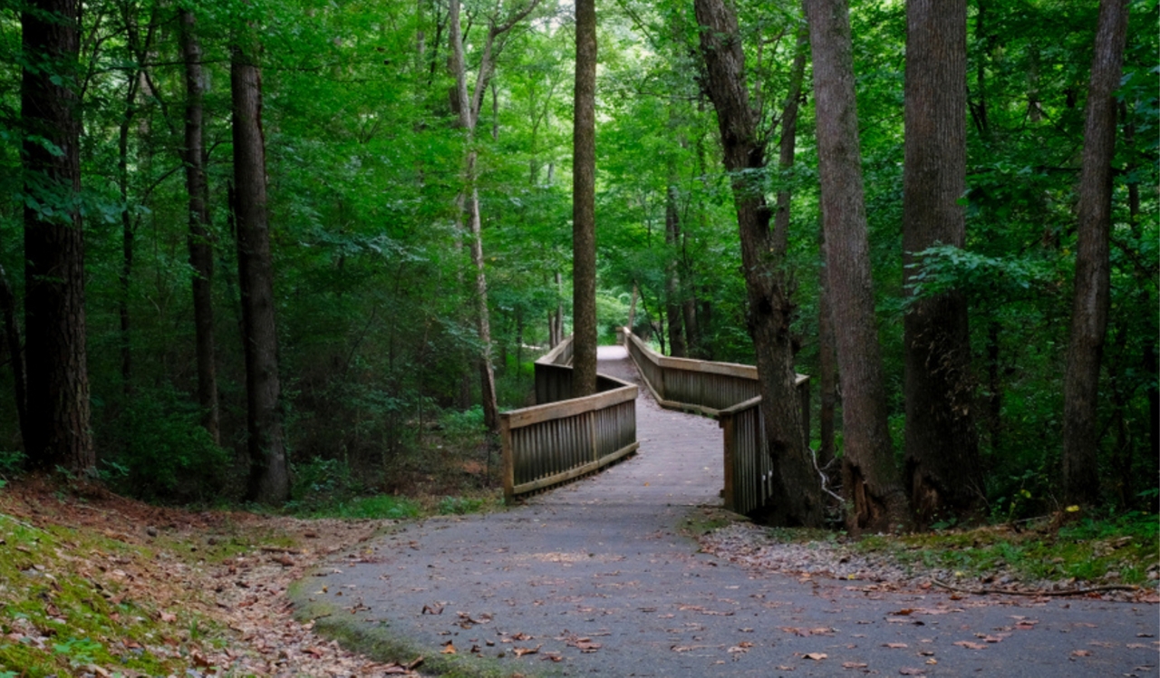 Sunnybrook Residences - Raleigh, NC - Walnut Creek Trail.<p style="text-align: center;">&nbsp;</p>
<p style="text-align: center;">Explore scenic Walnut Creek Trail just minutes away, offering 15 miles of diverse landscapes and environments perfect for leisurely hikes or invigorating bike rides.</p>
