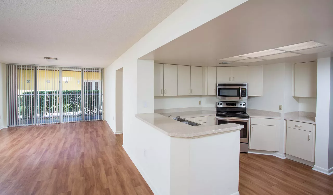 Waterways Village Apartments in Aventura, FL - Kitchen and Living room 