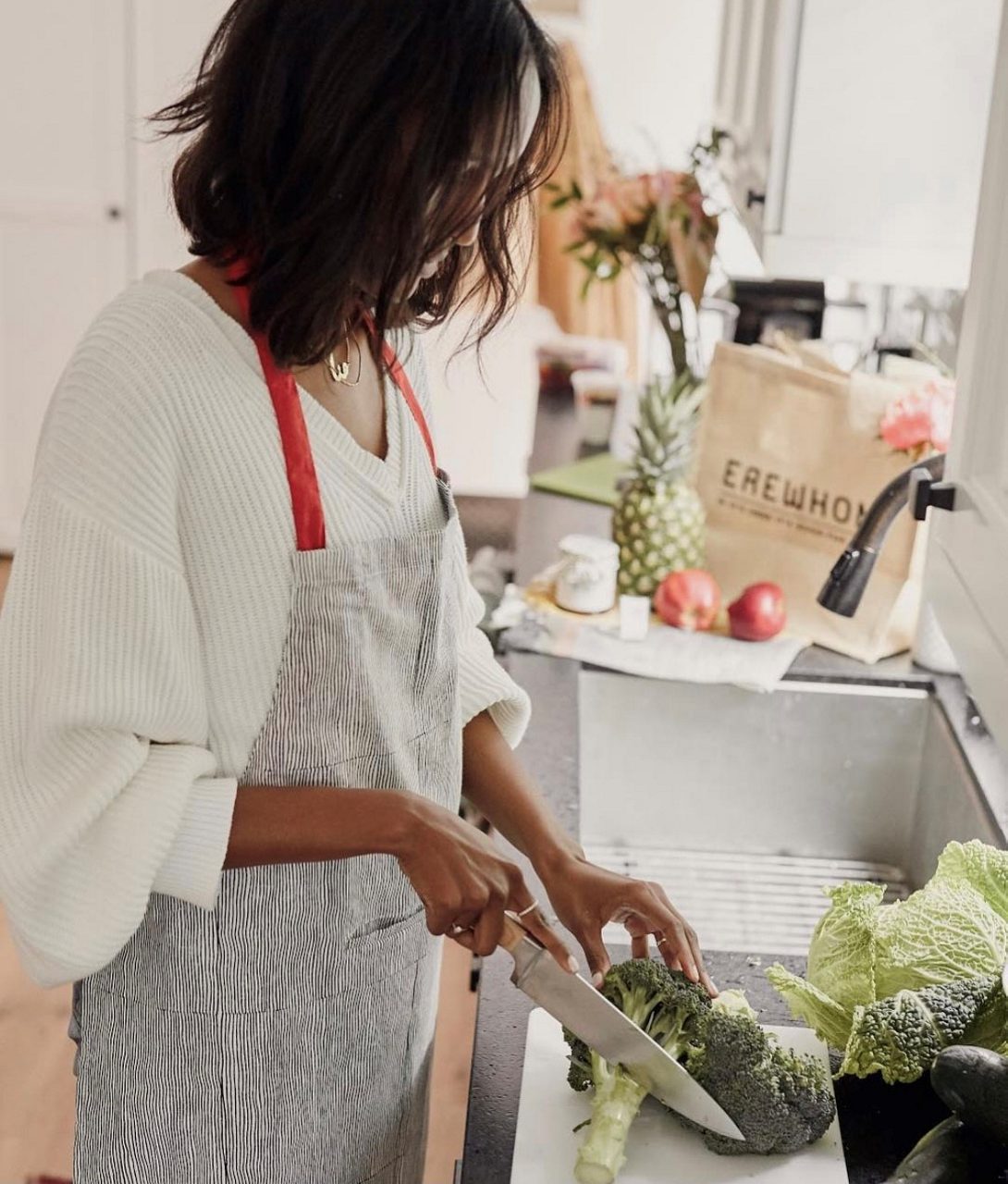 Person chopping vegetables from Erewhon