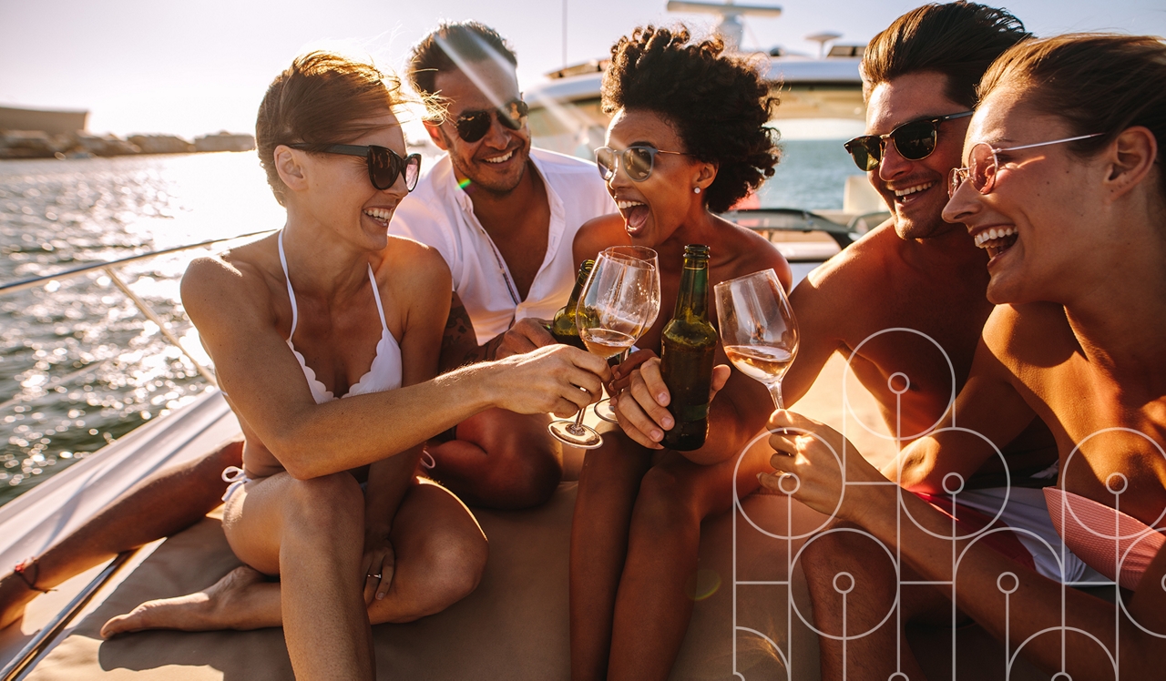 Flamingo Point | Miami, FL | Group of young people on speedboat, laughing