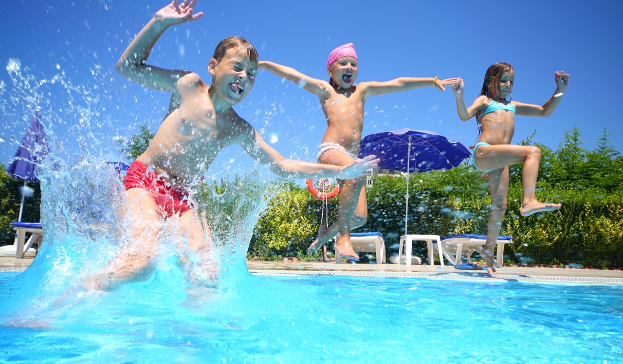 Royal Crest Warwick - Warwick, RI - Kids jumping into the pool