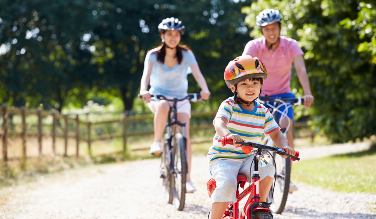 Hidden Cove - Escondido, CA - Man, woman, and child biking