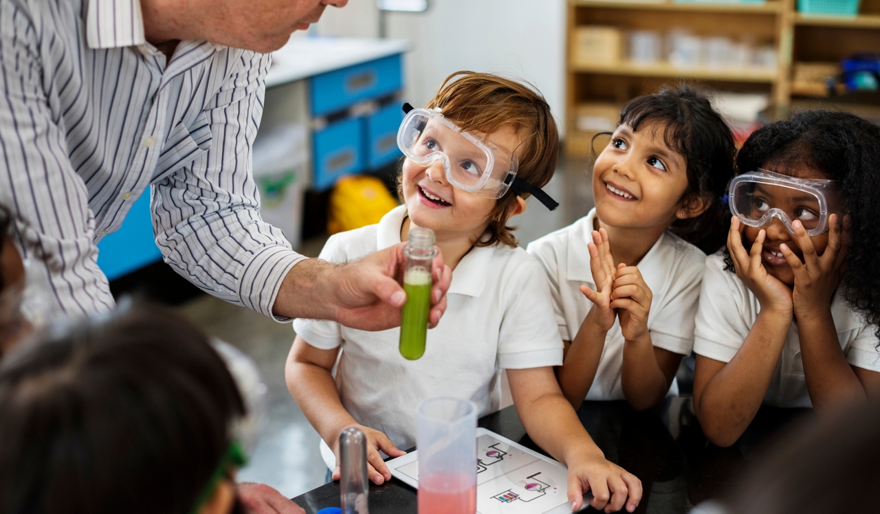 Hidden Cove | Escondido, CA | Children in classroom doing chemistry experiment.<div style="text-align: center;">The morning drive to your child's school is easy. Hidden Cove is just 7 minutes from Miller Elementary, 1 minute from Del Dios Academy, and 9 minutes from San Pasqual High.</div>
