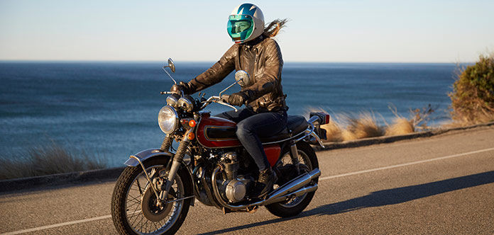 Woman Riding a Motorcycle