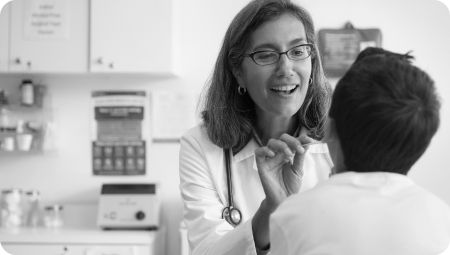 Doctor examining young patient