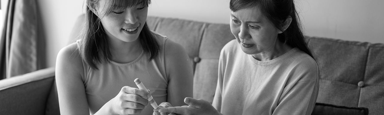 Mother and daughter learning about diabetes
