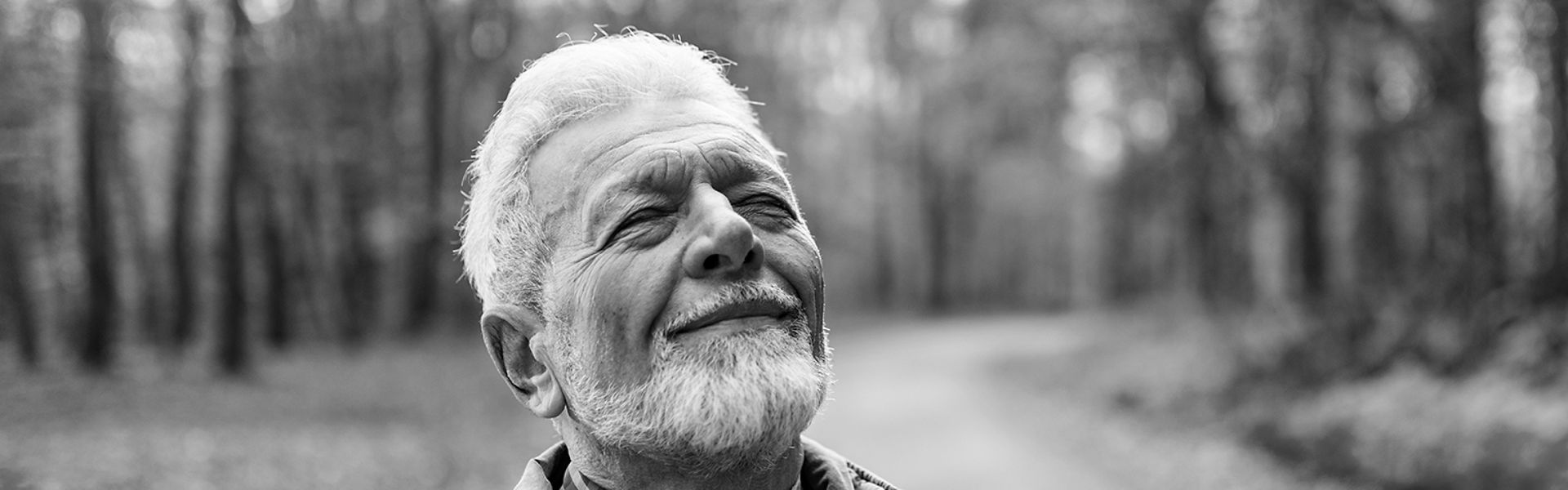 Man outside looking up 