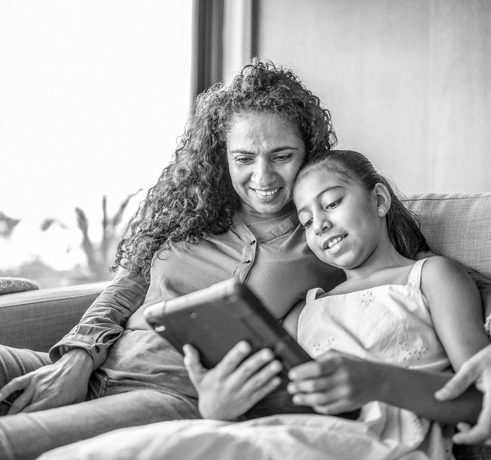 Mother daughter on ipad
