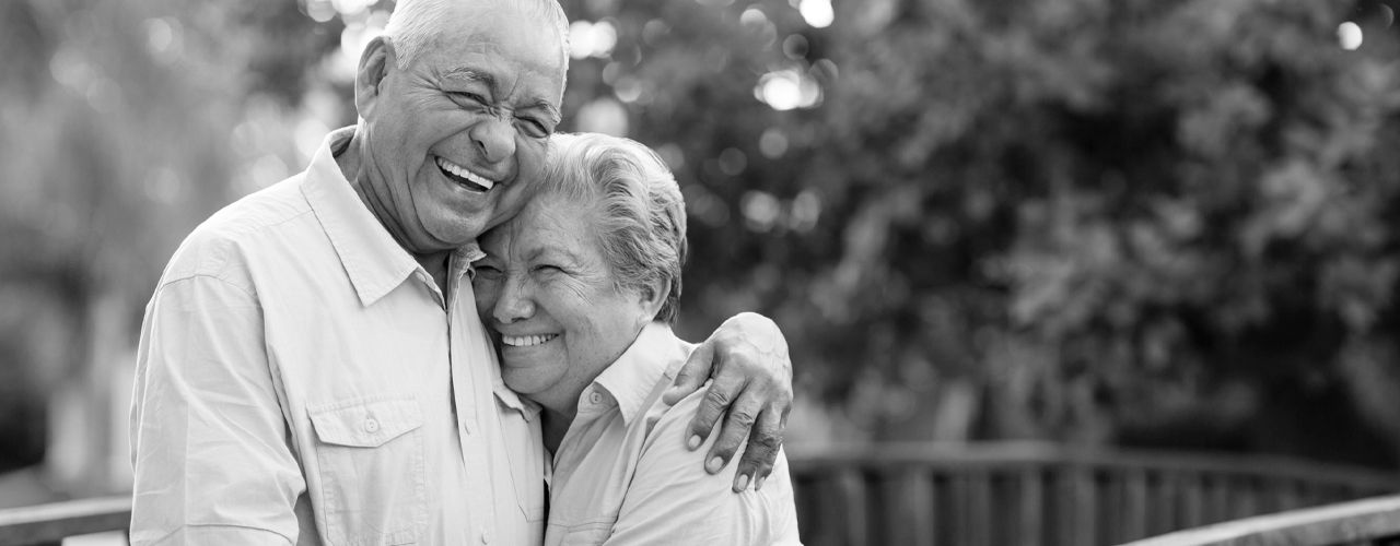 Senior couple hugging