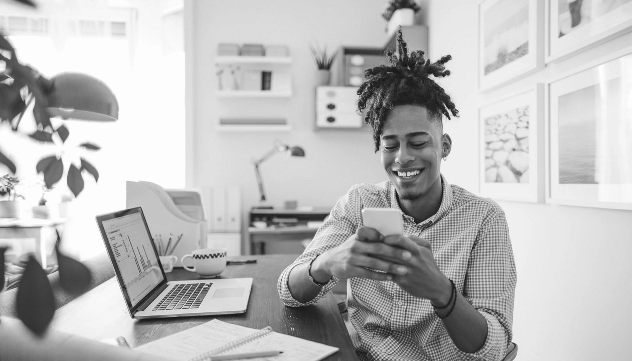 content remote employee reviewing his job benefits