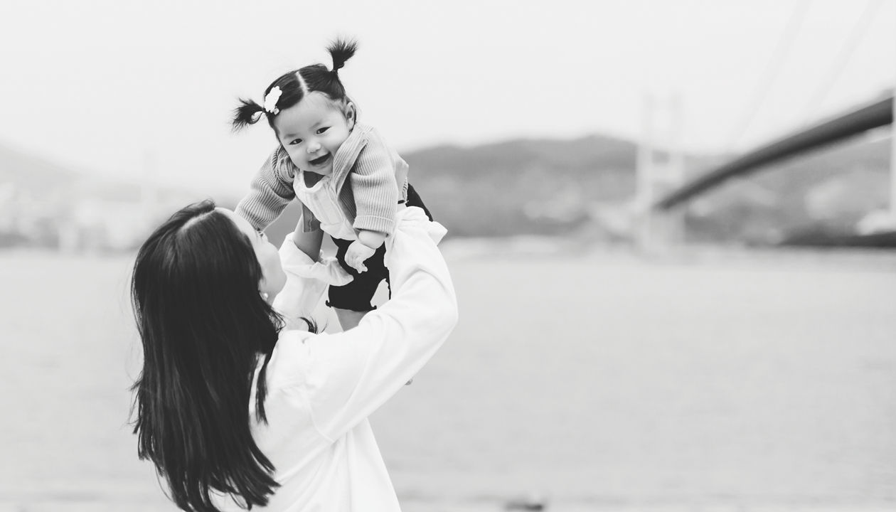 man playing with daughter