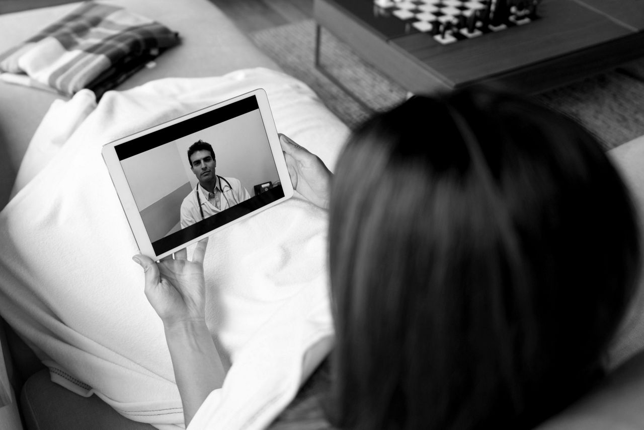 woman looking at ipad