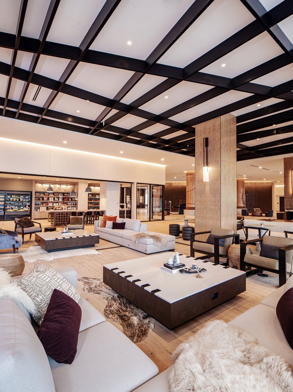 Hotel featuring multiple tables featuring quartz countertops.