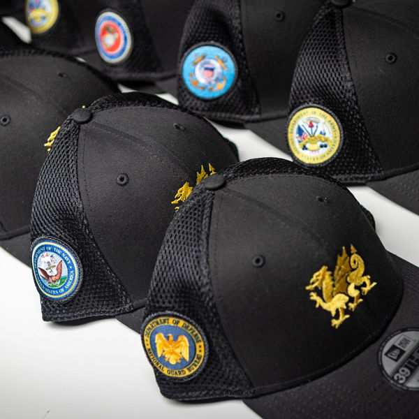 Service hats awarded to active and former military Cambria employees