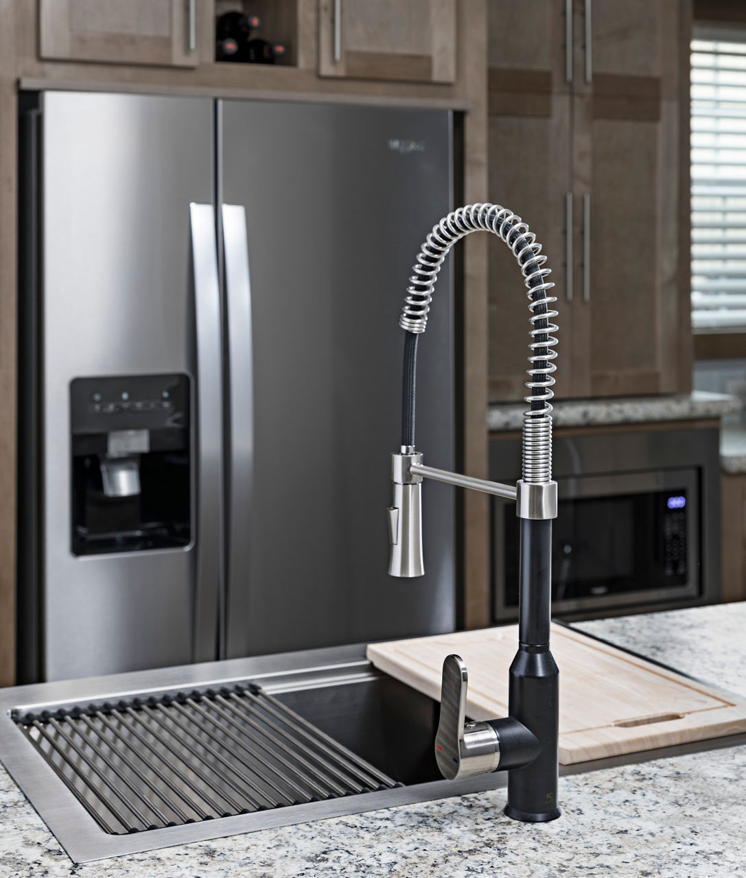 The Ultimate Kitchen Three with stainless steel kitchen sink and gooseneck faucet