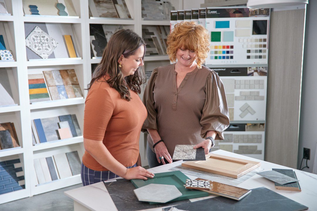 Two women looking at a design