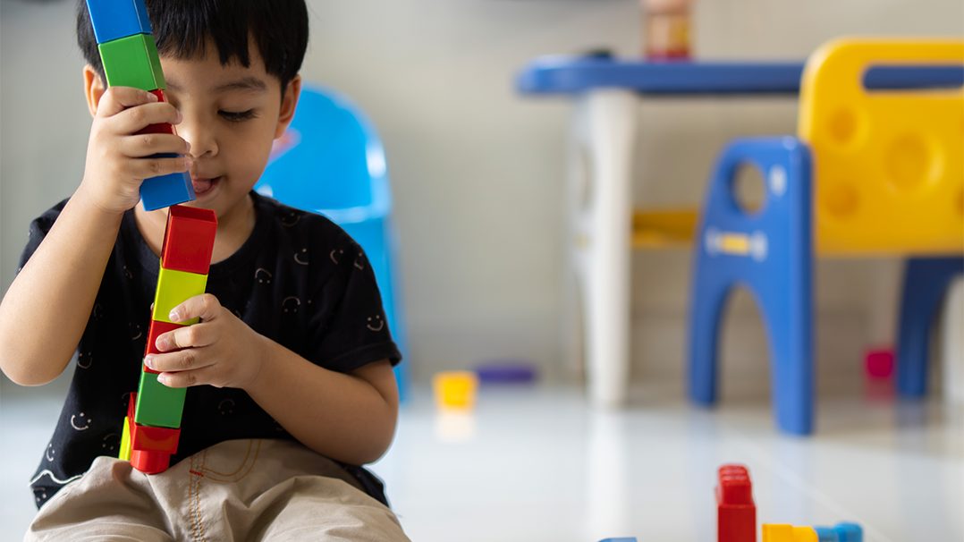 Boy playing with blocks