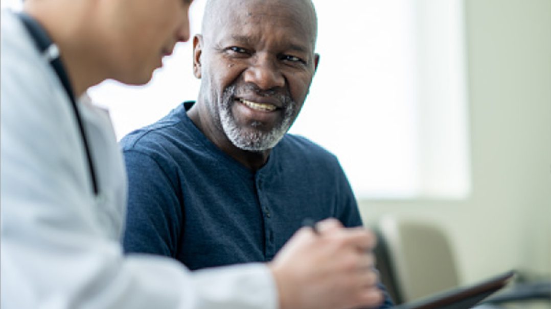 Person listening to healthcare professional