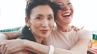 Two women hugging