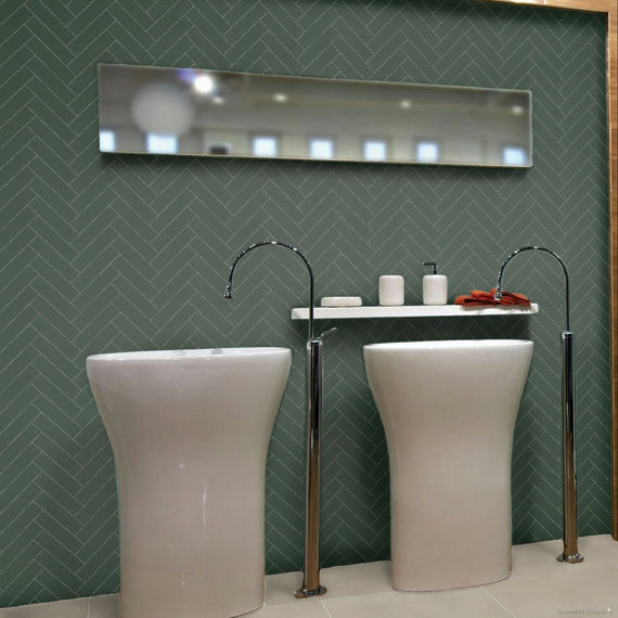 Bathroom with double column sinks, blue rectangle wall tile in herringbone pattern on back wall, white square floor tile, and silver accents.