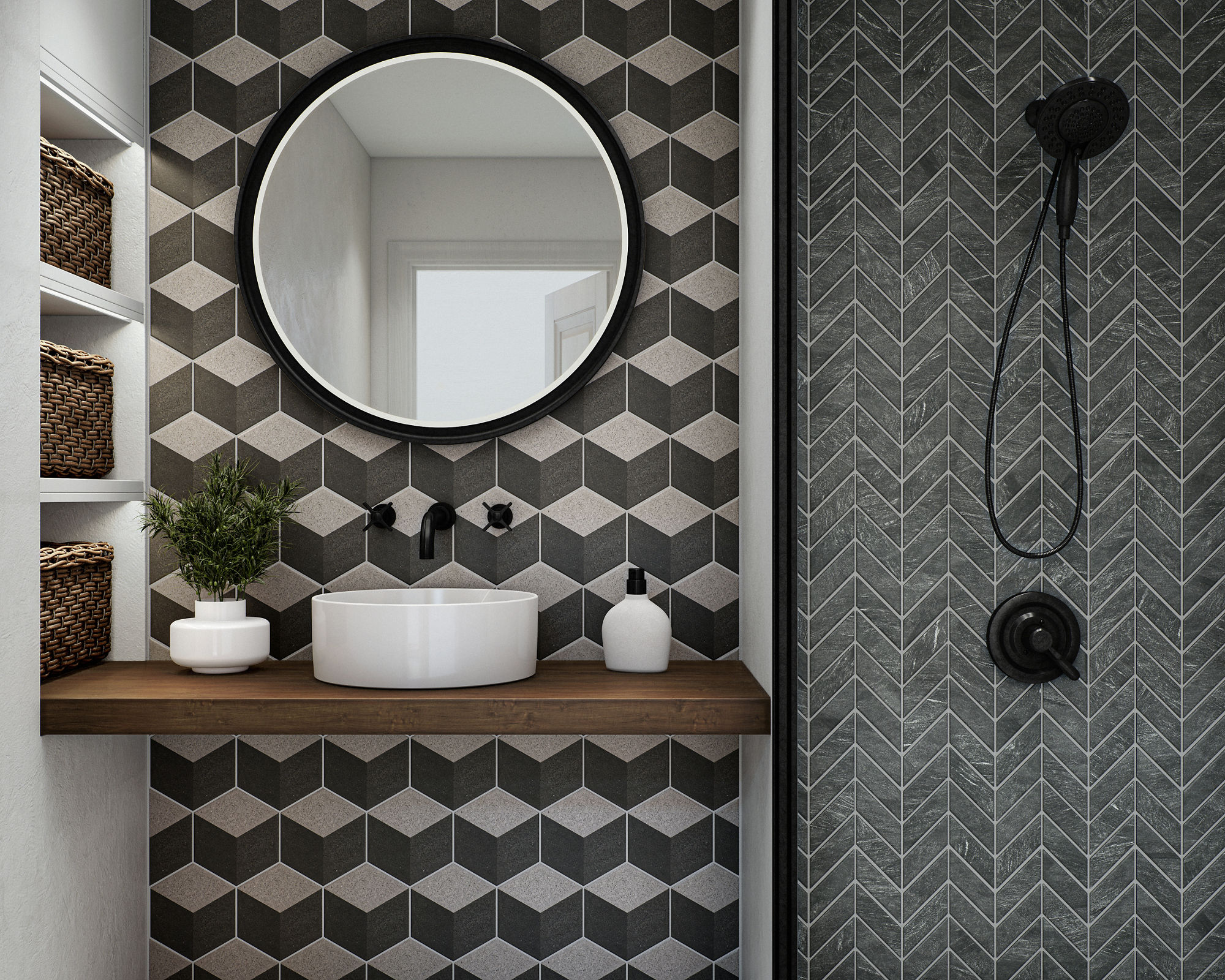 Bathroom with gray encaustic 3d cube design tile on back wall, gray chevron stone look tile on shower wall, gray square stone look mosaic tile on shower floor, white stone look rectangle floor tile, wood counter, white sink, and black accents.