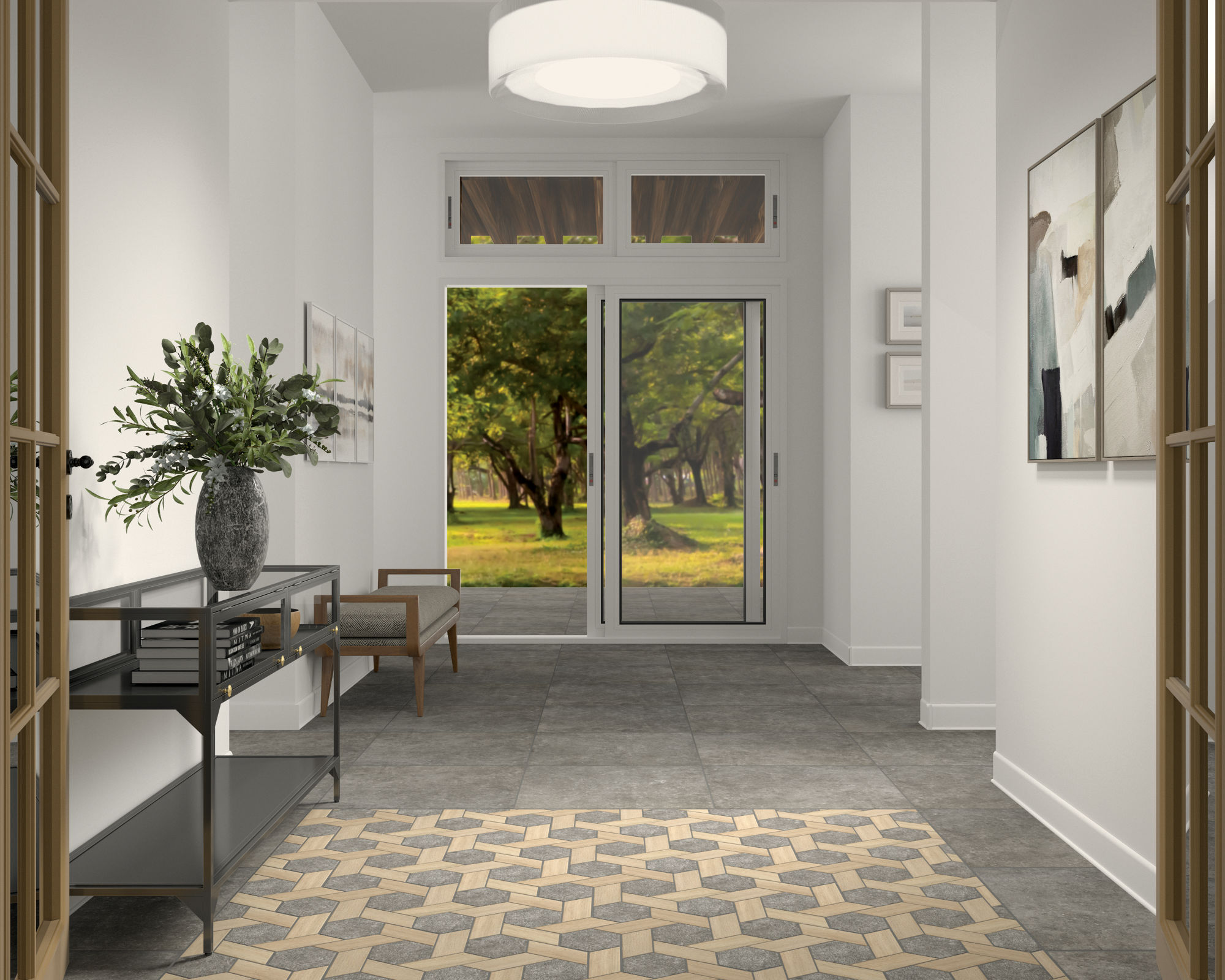 Entry space with gray stone look tile on floor, gray mosaic tile in center of floor, white walls, and wood accents.