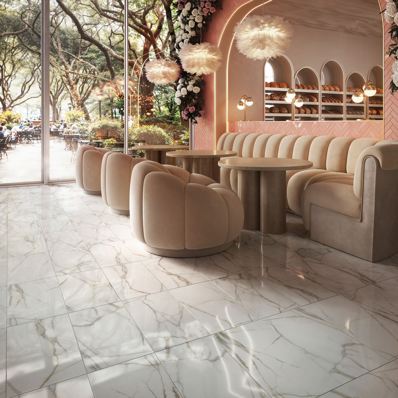 Restaurant with white marble look rectangle floor tile, pink rectangle tile on walls in chevron pattern, beige booth and chairs, and floor to ceiling windows showing trees. 