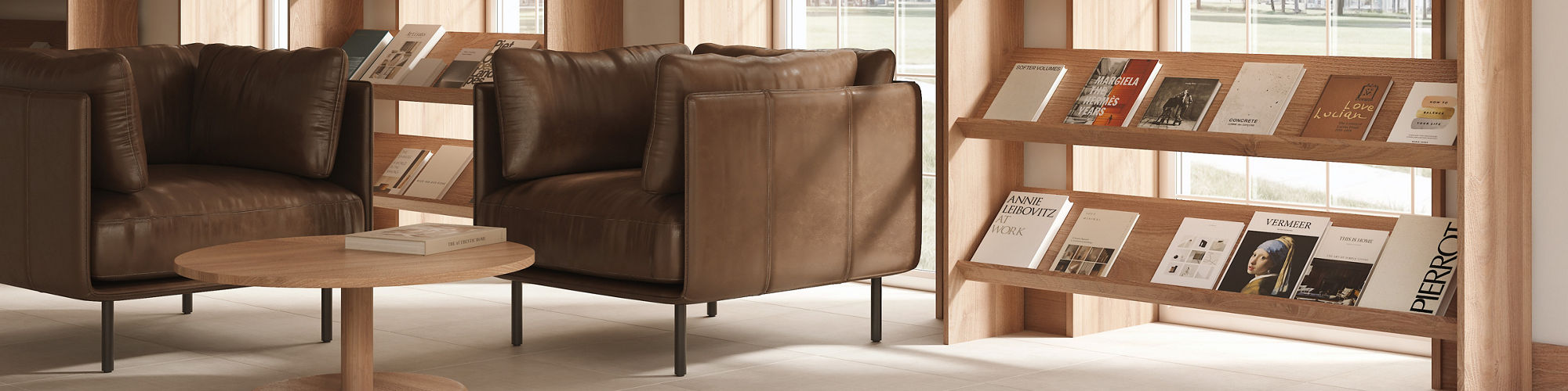 A contemporary reading lounge features tall arched windows that fill the space with natural light. Wooden bookshelves line the walls, displaying neatly arranged books and magazines. Two brown leather armchairs and a round wooden coffee table create a