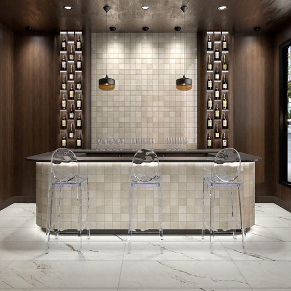 Bar with clear bar chairs, dark wood walls, and square beige wall tile on back and back wall.
