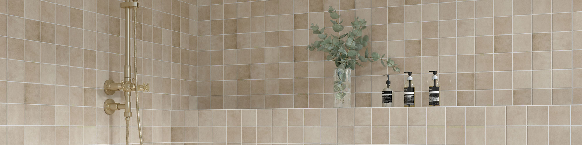 Shower with square beige wall tile on walls.