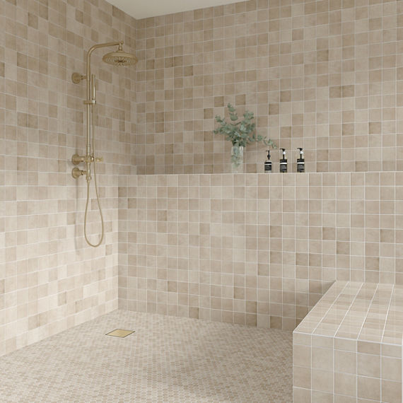 Shower with square beige wall tile on walls.