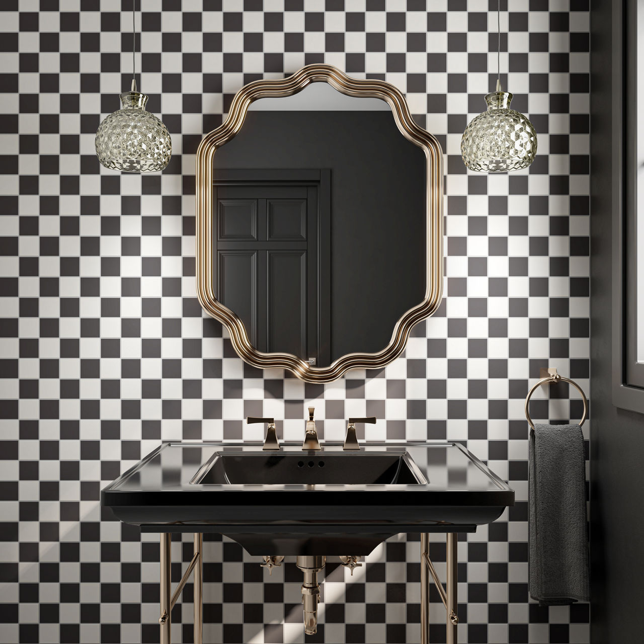 Bathroom with black and white checkered mosaic on wall, black sink, golden accents, and a mirror above sink.