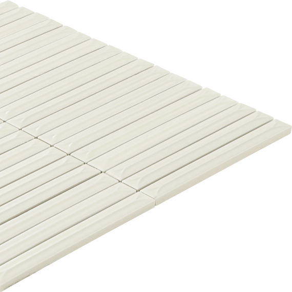 Image of a square panel composed of narrow white rectangular slats. The slats are arranged in parallel rows with a subtle groove between each piece. The surface appears smooth and glossy, suggesting use as decorative wall or floor tiling. The panel i