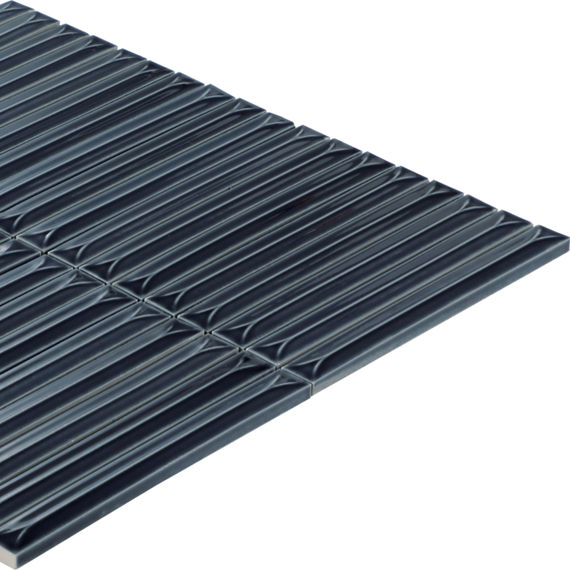 A metallic ribbed floor grating panel is shown isolated on a white background. The panel features parallel raised ridges and a grid-like pattern for enhanced traction. Its dark, reflective surface suggests durable industrial construction. The clean, 