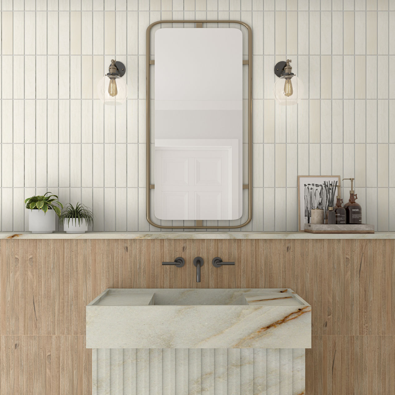 A contemporary bathroom features a marble sink with a ribbed front set into a wooden vanity. Vertical white wall tiles create a clean backdrop behind a rectangular mirror with rounded corners. Two exposed-bulb wall sconces flank the mirror, adding wa