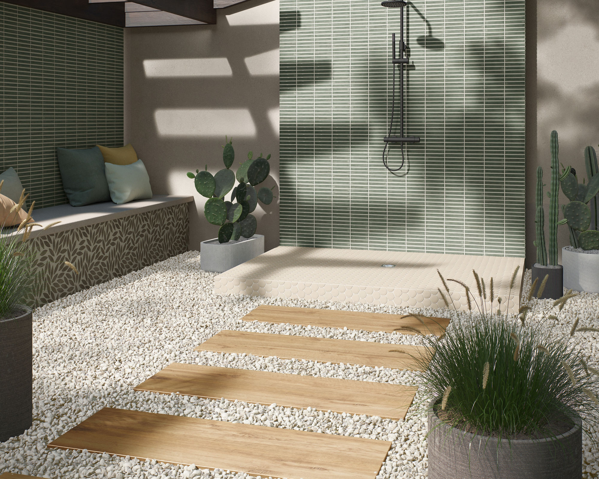 Outdoor shower with wood look floor tile creating a path, green rectangle mosaic tile on shower wall, gray side walls, and cacti throughout shower area.