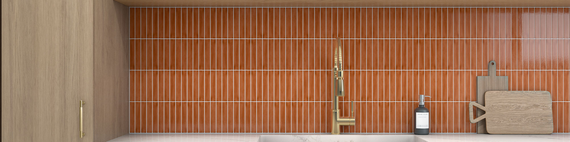 Kitchen with orange rectangle mosaic on backsplash, wood cabinets, white marble look countertop, and wooden shelves with dishes and plants.